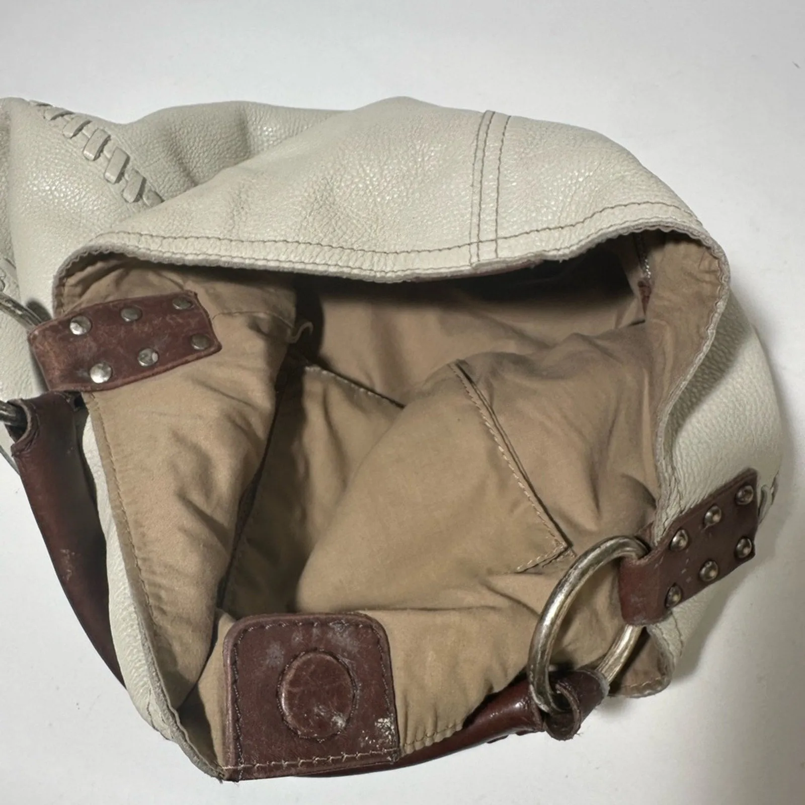 White and Brown Hobo Bag with Textured Leather and Slouchy Shape